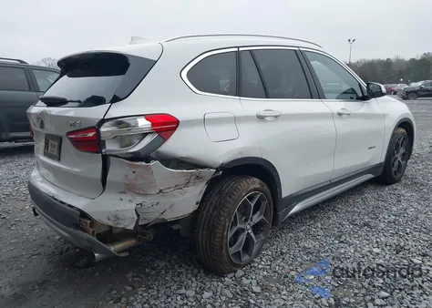 2016 BMW X1 z USA, uszkodzony, nr VIN WBXHT3C3XG5E52218